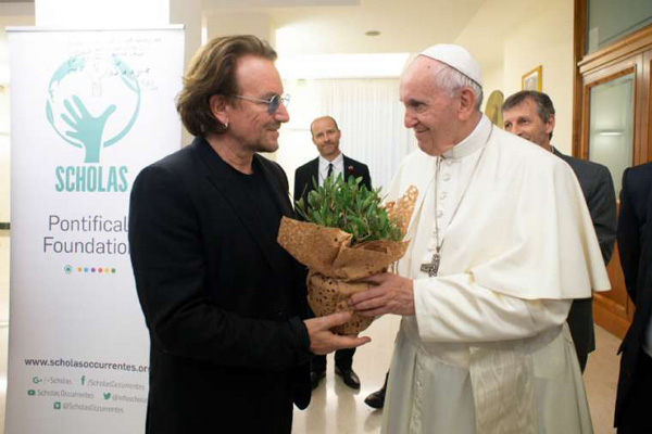 Francis receives Bono 1